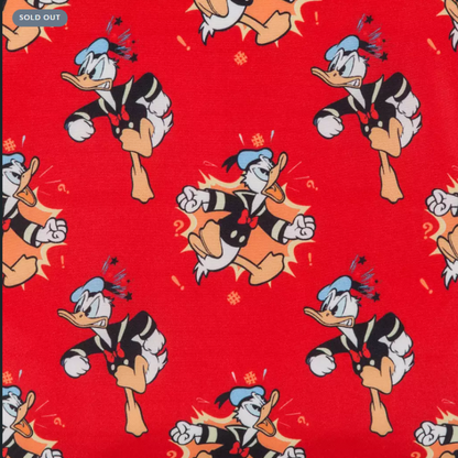 Cartoon character pattern on a red background with 'SOLD OUT' label.