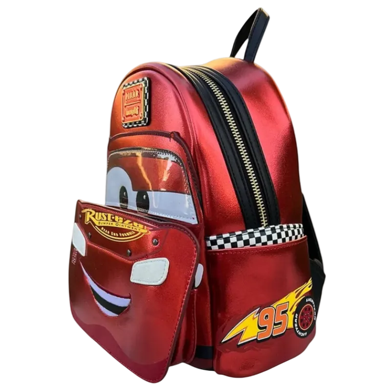 Red backpack with character face design on a white background