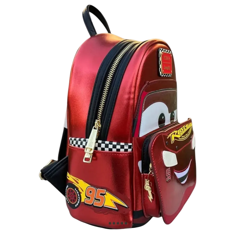 Red backpack with cartoon character design on a white background