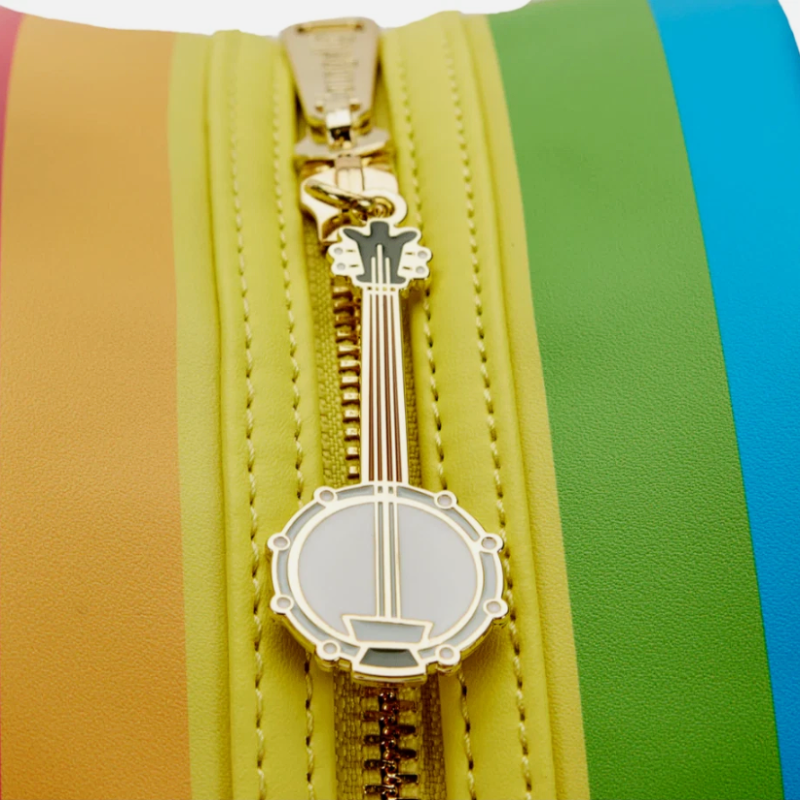 Colorful striped pouch with a gold zipper and banjo-shaped keychain on a multicolored background