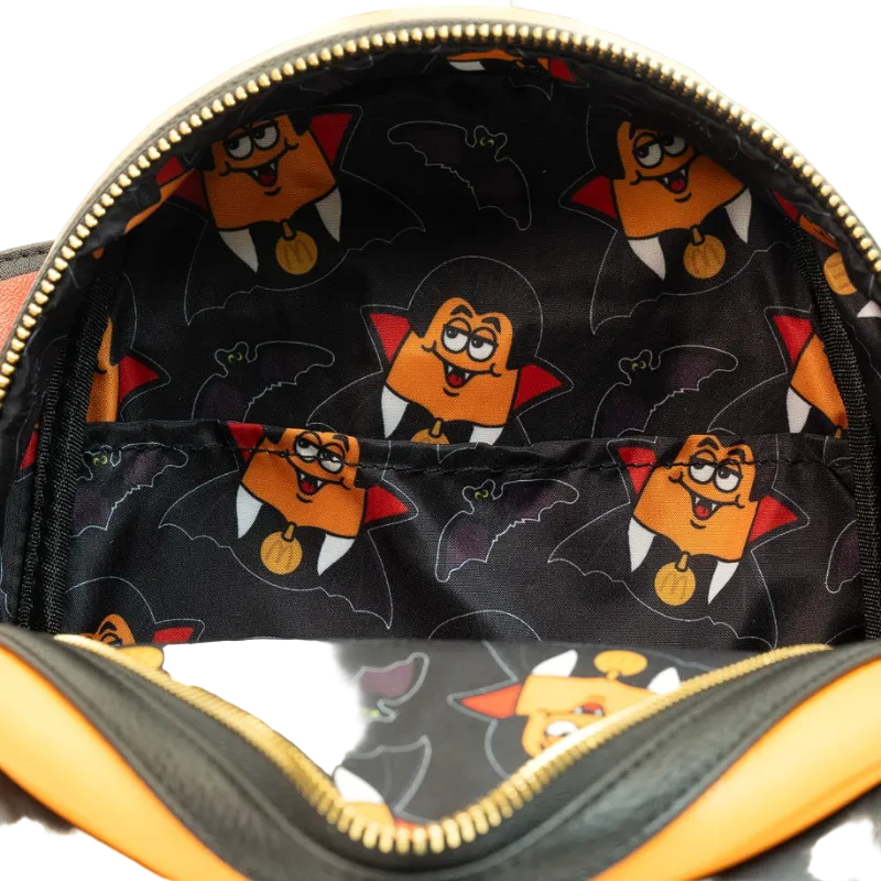 Backpack interior with cartoon character pattern on a black background