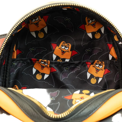 Backpack interior with cartoon character pattern on a black background