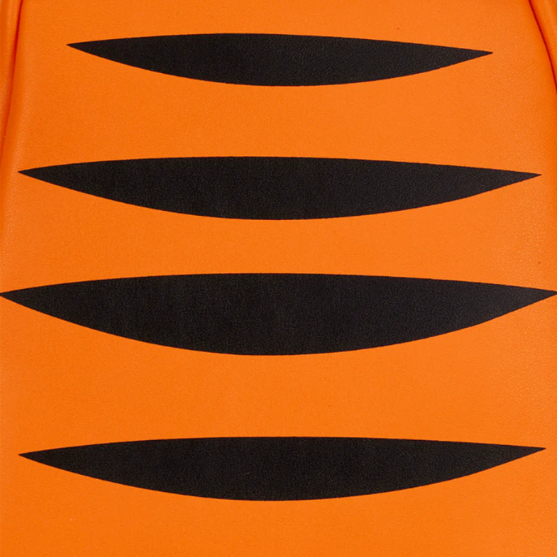 Close-up of orange fabric with black wavy patterns