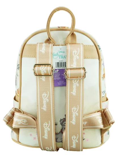 Backpack with decorative ribbons and a visible brand label on a white background