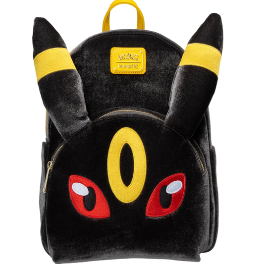 A plush black Pikachu-themed backpack with yellow ear bands, a yellow Pokémon logo patch, and red embroidered eyes on a white background.