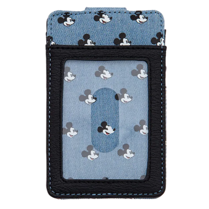 A Disney-themed card holder wallet featuring a light blue denim-like pattern with black, white, and gray Mickey Mouse silhouettes, framed by a black faux-leather border with light blue stitching.