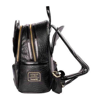 A black faux-snakeskin textured mini backpack with gold zippers and a gold-tone logo plate reading 'universal studios loungegang', shown on a white background.