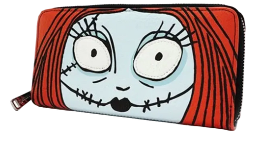 A zip-around wallet featuring a cartoon face with large white eyes, black stitched details, and red hair on a white background.