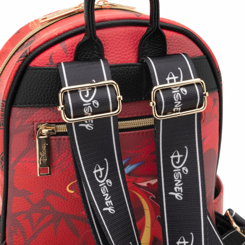 Red backpack with black straps featuring Disney logo on a white background