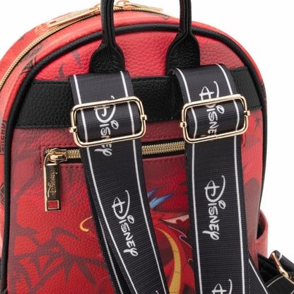Red backpack with black straps featuring Disney logo on a white background