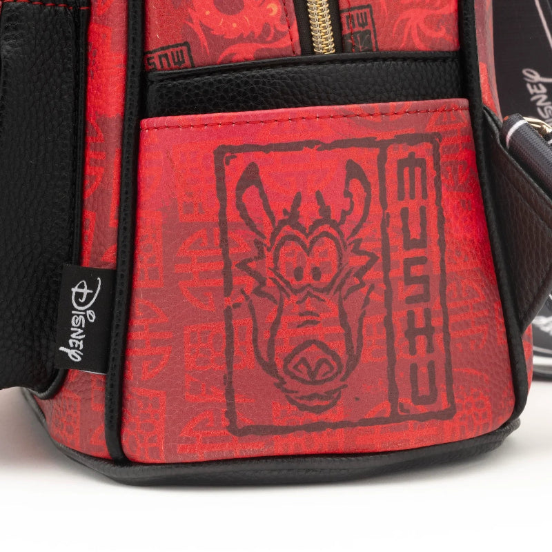 Red bag with black design and 'Disney' branding on a white background