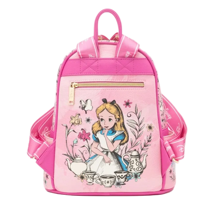A pink Disney-themed backpack featuring Alice in Wonderland, with a quilted top, gold zipper, and floral tea-time illustration on the front, shown against a plain white background.