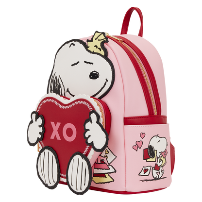 Pink backpack with cartoon character holding a heart and a crown, on a white background