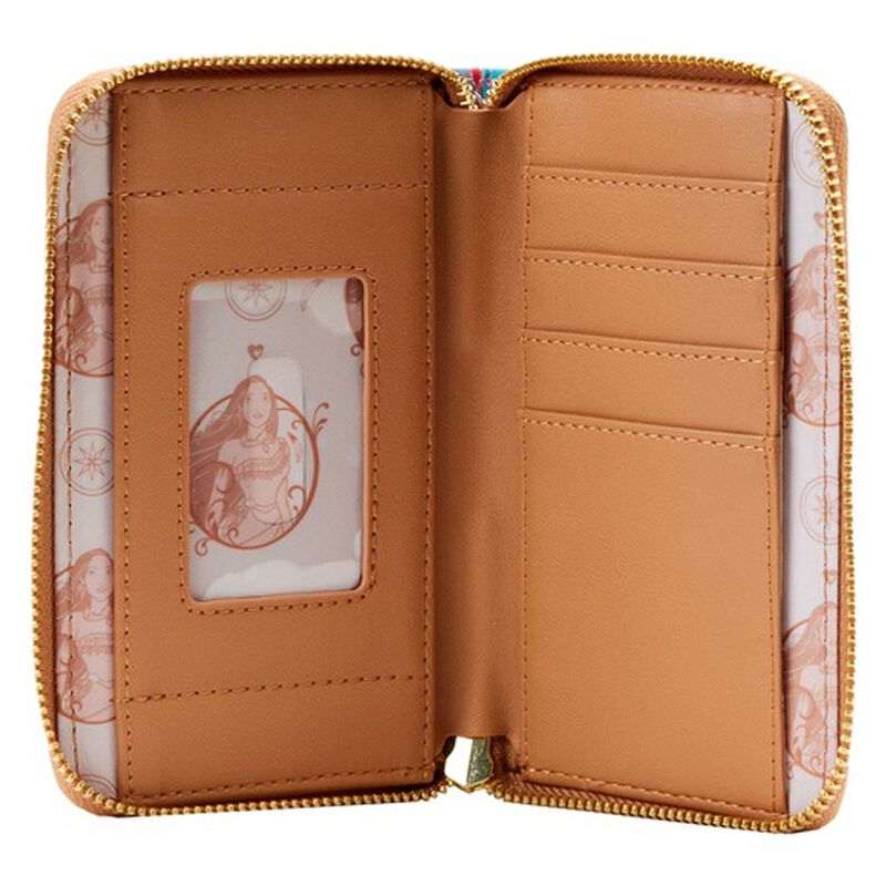 An open zip-around wallet in tan faux leather with gold-tone zipper trim, showing interior card slots and a clear ID window with a pink illustrated insert. The outer fabric has a subtle pink and white patterned print.