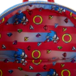 Colorful children's plate with cartoon characters on a red, white, and blue background
