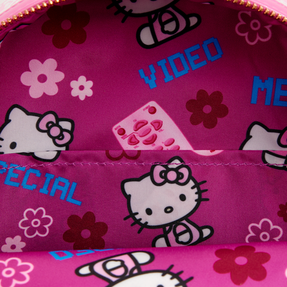 Pink pouch with Hello Kitty design featuring flowers and text.