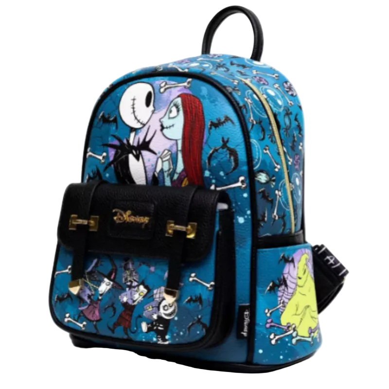 A Disney-themed backpack featuring characters from 'The Nightmare Before Christmas' including Sally, Jack Skellington, and the Ghostface, printed on a blue background with black and white skeleton motifs. The backpack has black faux-leather trim, gold-tone hardware, and a front pocket with a Disney logo.