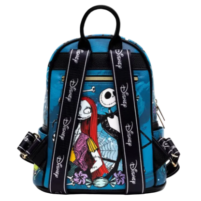A Disney-themed backpack featuring a blue background with a printed illustration of Sally from The Nightmare Before Christmas, black shoulder straps with white Disney logos, and gold-tone hardware, shown against a plain white background.