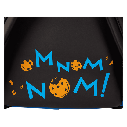 Black bag with 'M NOM NOM!' text and cookie graphics in blue and orange.