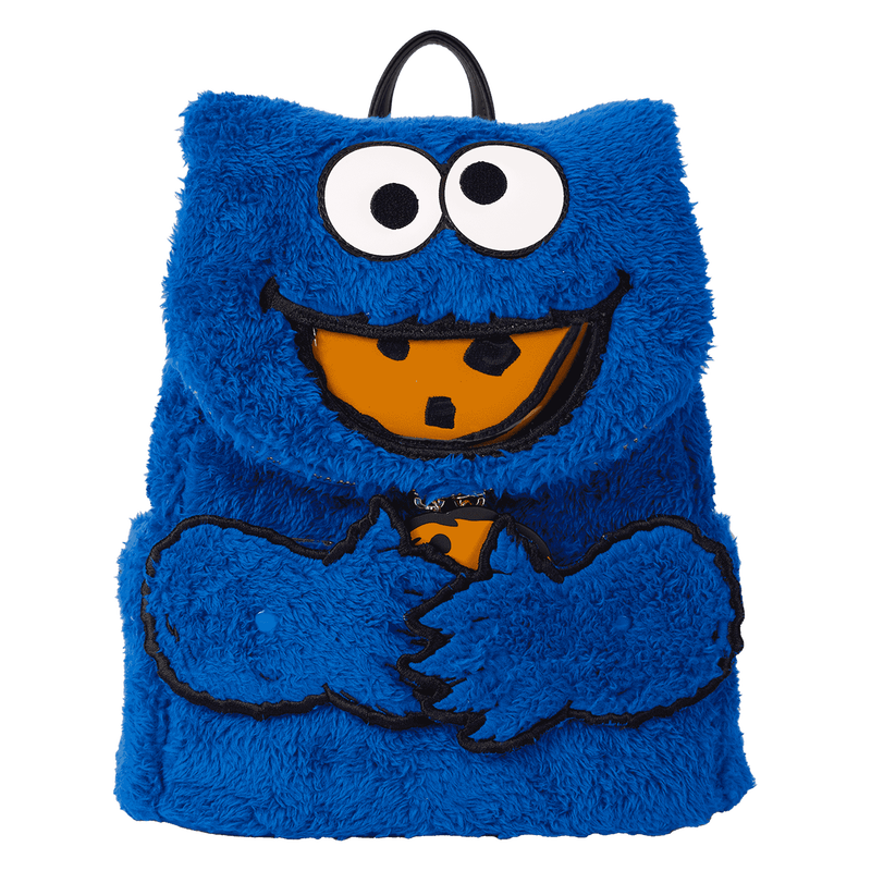Blue furry backpack with a smiling face design on a white background