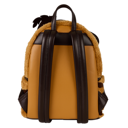 Backpack with brown leather and fur accents on a white background