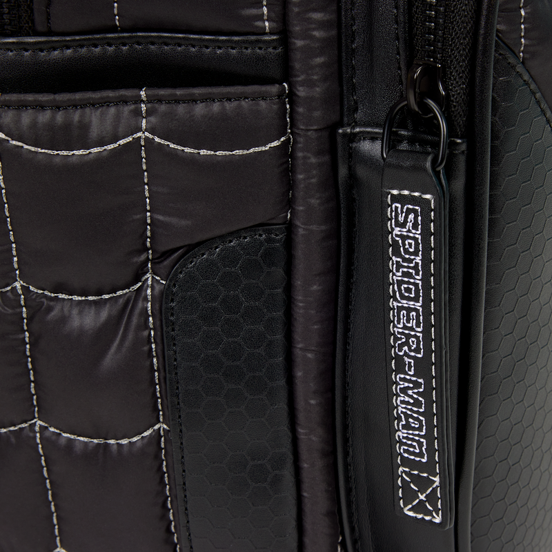 Close-up of a black Spider-Man backpack with detailed stitching and brand logo.