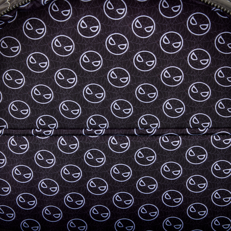 Pattern of white faces on a black background