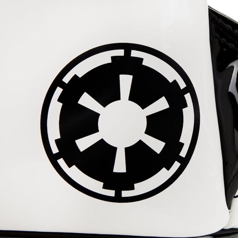 Black and white emblem on a white surface