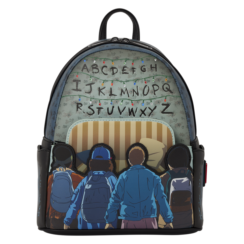 A black backpack featuring a graphic print of the 'Stranger Things' alphabet board and Eleven and other characters seen from behind, on a solid white background.