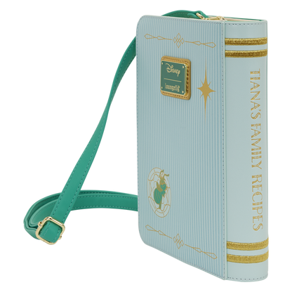 Book-shaped handbag with 'Tiana's Family Recipes' text and Disney logo on a white background