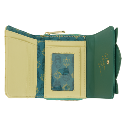 Green and beige wallet with a decorative interior panel on a white background