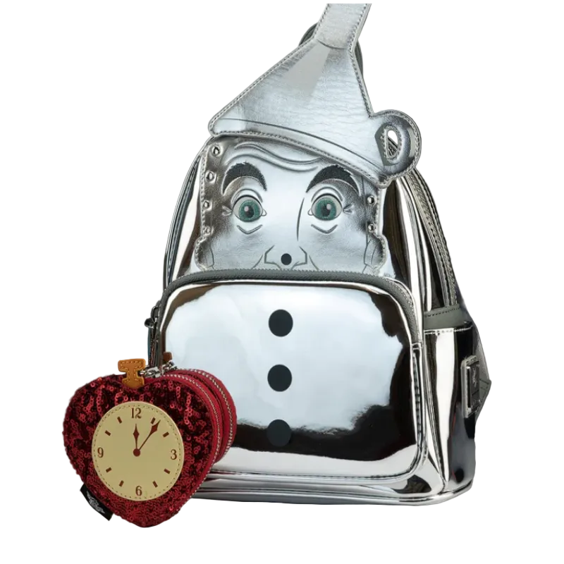 Metallic tin man backpack with a heart-shaped clock attached on a black background