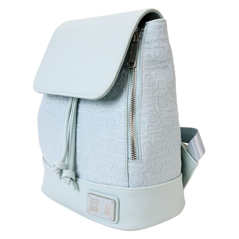 Light blue backpack with a textured pattern on a white background