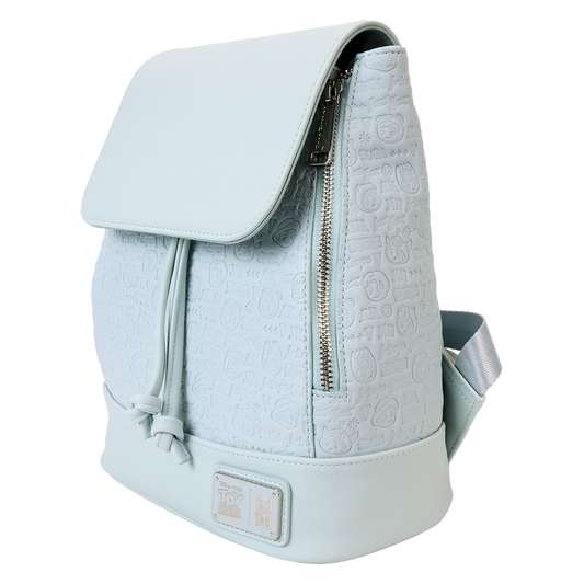 Light blue backpack with a textured pattern on a white background