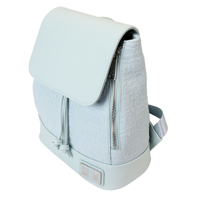 Light blue backpack with a textured pattern on a white background