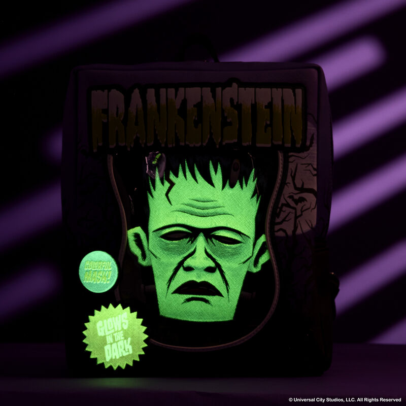 Glowing green Frankenstein design on a dark background