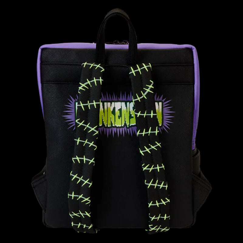 Black backpack with purple accents and 'Nikes' branding on a white background