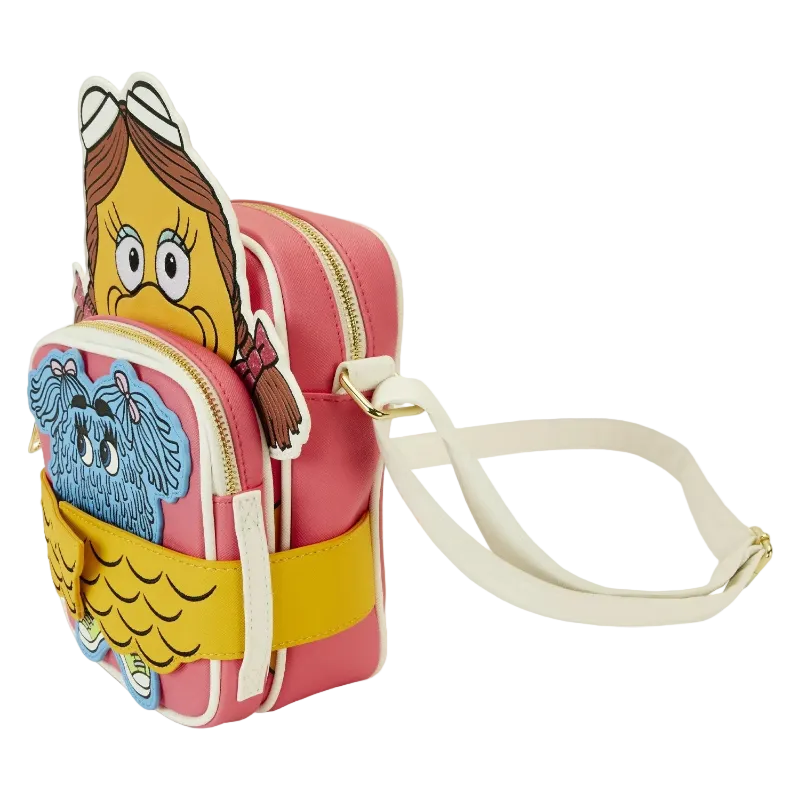 Cartoon-themed pink crossbody bag with character face on a white background