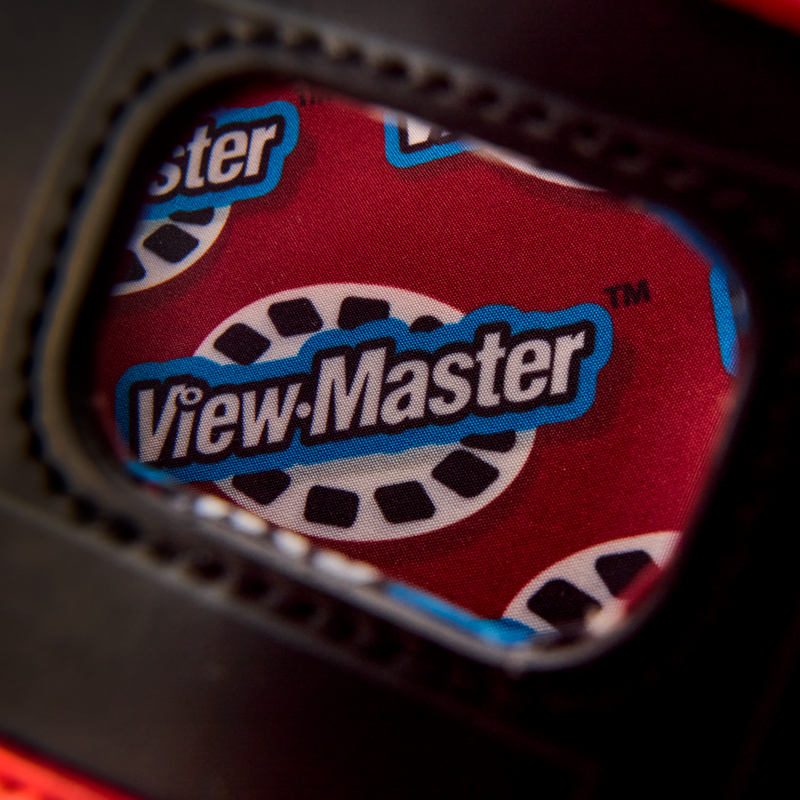 Close-up of a View-Master toy, focusing on the brand logo.