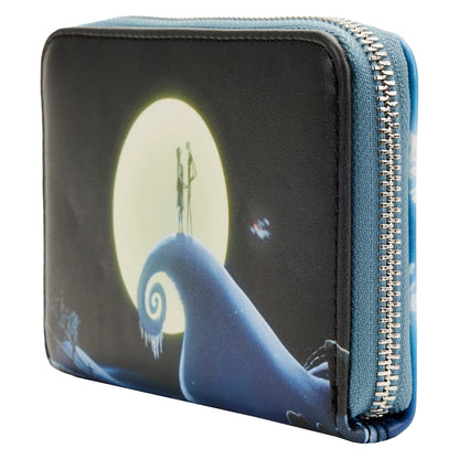 Zipper wallet with a design of a character standing on a whale against a moonlit sky.
