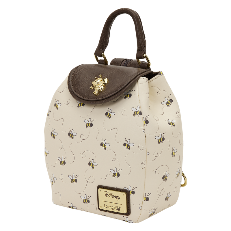 Beige backpack with bee pattern and brown top flap on a white background