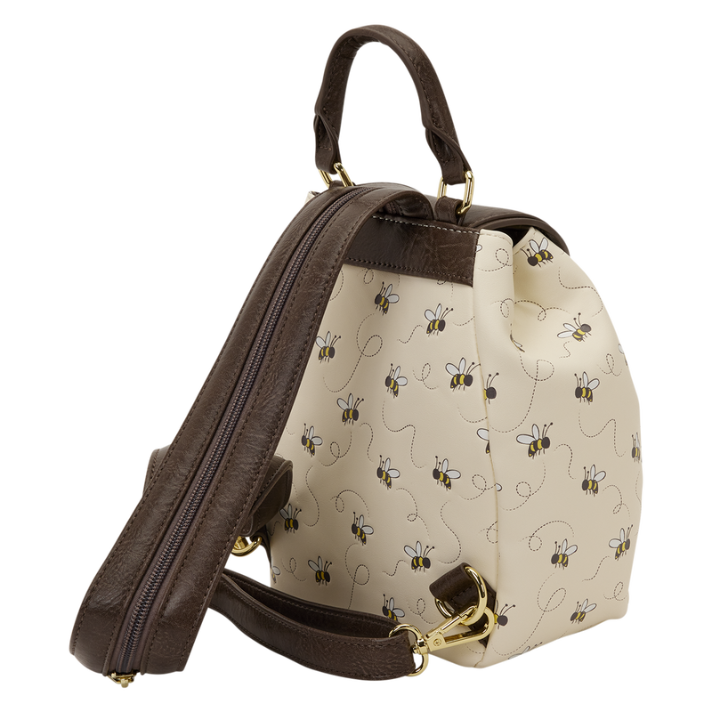 Backpack with brown straps and a patterned beige front panel on a white background
