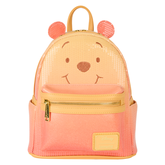 Pink and yellow backpack with bear face design on a white background