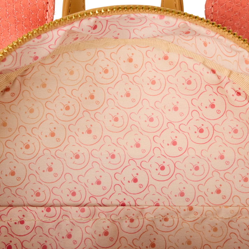 Close-up of a pink bag with teddy bear pattern