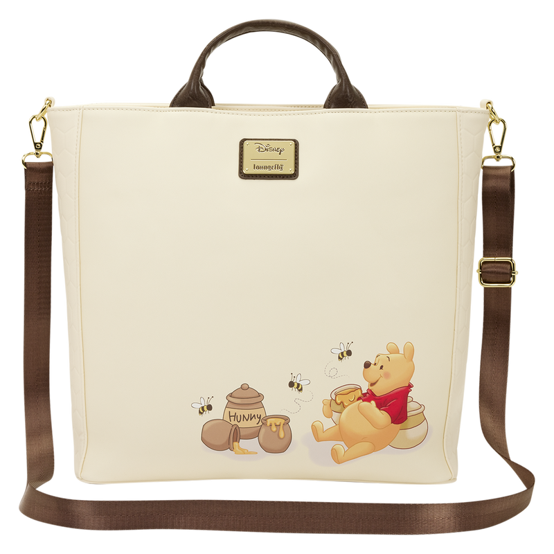 Beige bag with cartoon bear design featuring honey pots and bees, Disney logo visible.