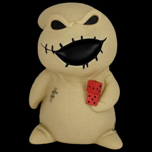 Beige plush toy with black face and red dice on a white background