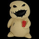 Beige plush toy with black face and red dice on a white background
