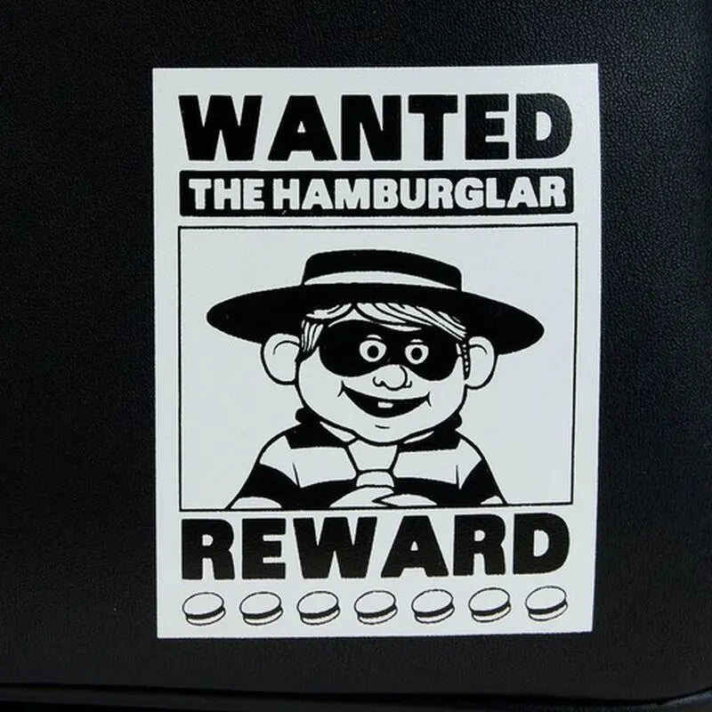 Wanted poster for 'The Hamburglar' with a black background