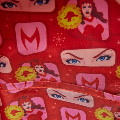 Red fabric with superhero-themed pattern featuring eyes, faces, and 'M' logo.