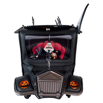Black car-shaped Halloween decoration with jack-o'-lanterns and a ghost figure inside.